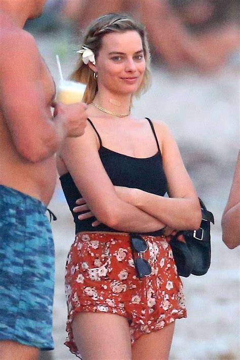 margot robbie in a thong|Margot Robbie poses in bikini bottoms and a cosy cardigan on。